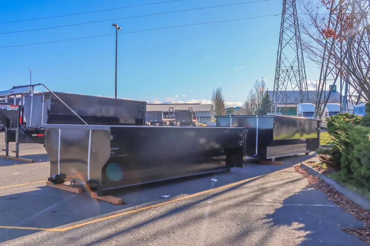 Roll-off dumpster ready for waste disposal at job site for Commercial Dumpster Rental in Frankenmuth